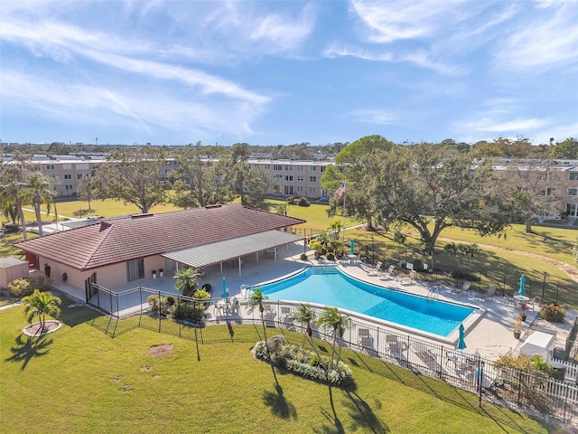 4915 Bay St NE Unit 123, Saint Petersburg, FL 33703 - view of swimming pool featuring a lawn and a patio