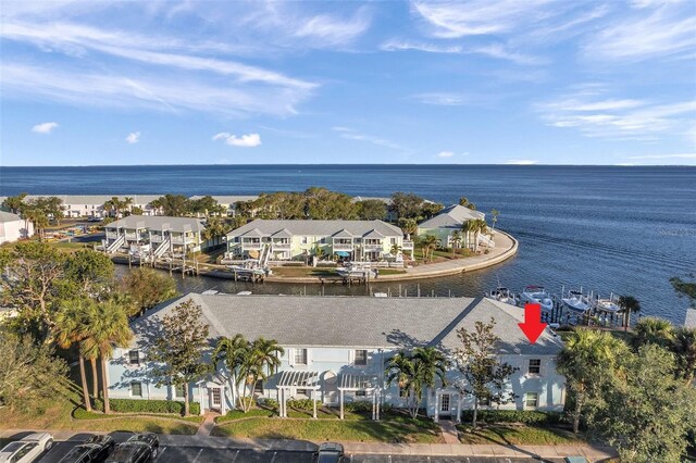 birds eye view of property featuring a water view