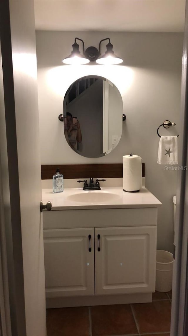 bathroom featuring vanity and tile patterned flooring