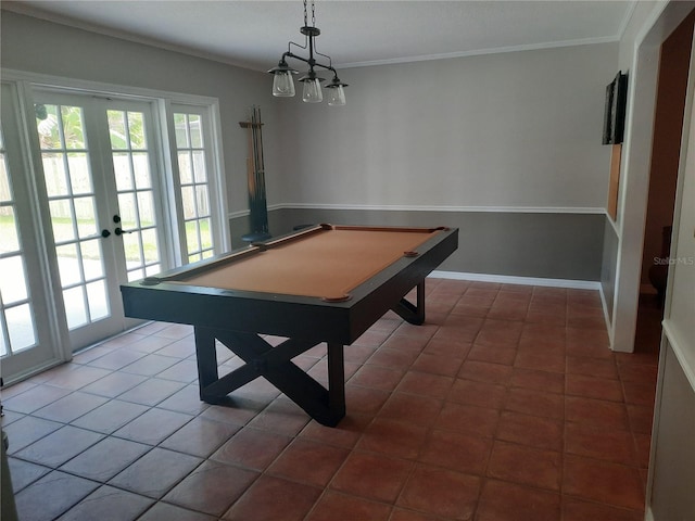 game room featuring dark tile patterned floors, billiards, ornamental molding, and french doors