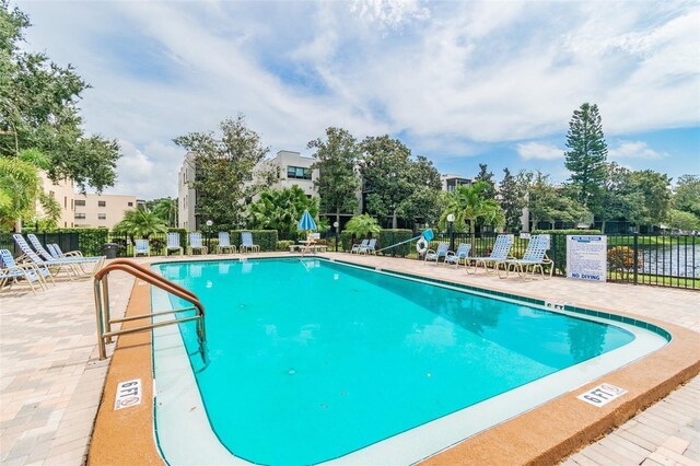 view of pool featuring a patio