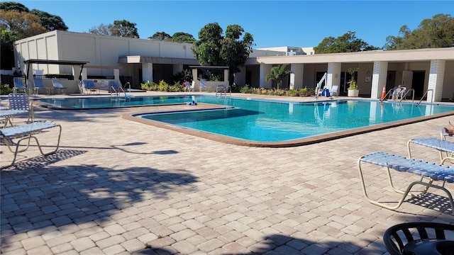 view of pool with a patio area