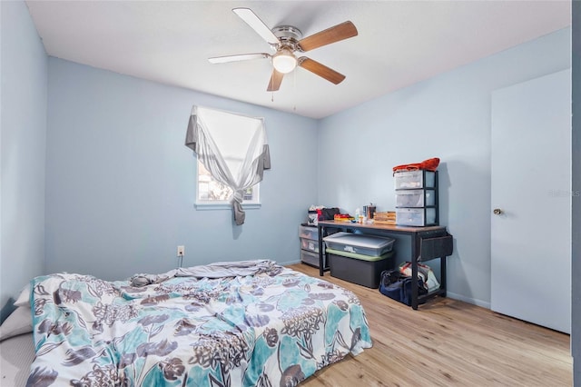 bedroom featuring ceiling fan and light hardwood / wood-style floors