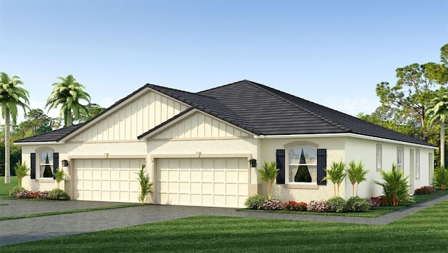 view of front of house with a front lawn and a garage