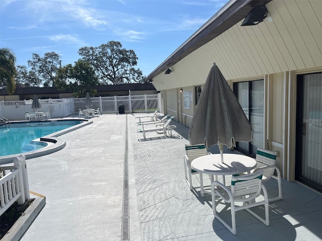 view of swimming pool featuring a patio