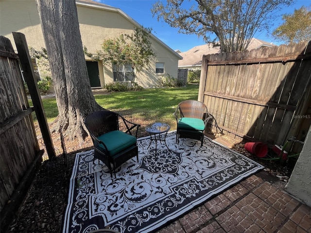 view of patio with fence