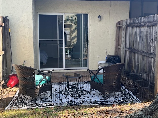 view of patio with fence