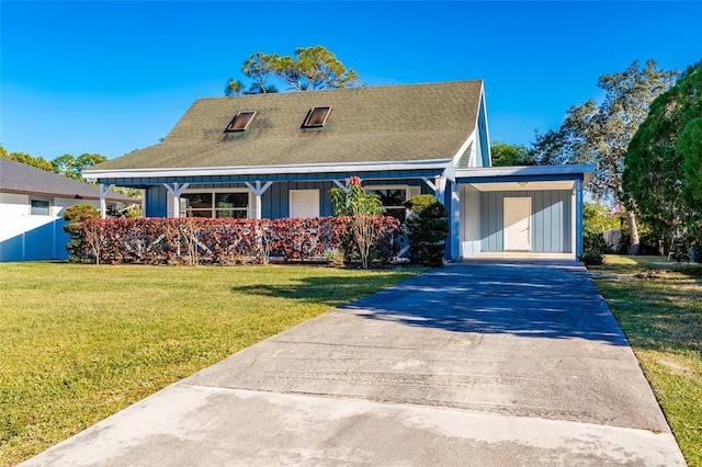 view of front of home with covered porch and a front yard