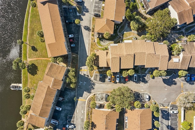 drone / aerial view with a water view