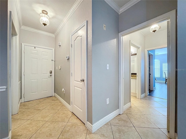 interior space with crown molding and light tile patterned floors