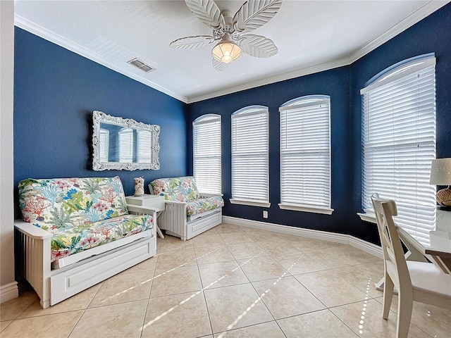 living area featuring ceiling fan, ornamental molding, and light tile patterned flooring