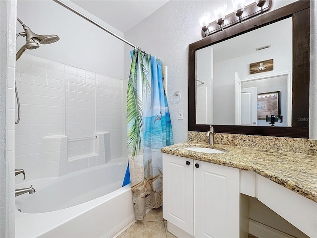 bathroom with tile patterned flooring, vanity, and shower / bathtub combination with curtain