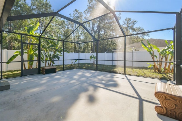 view of patio / terrace with a lanai