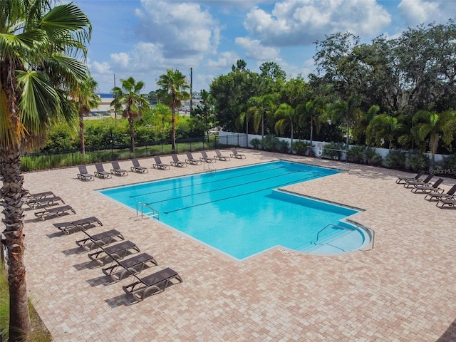 view of swimming pool featuring a patio