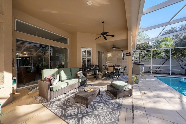 view of patio featuring a lanai, an outdoor living space, and a fenced in pool