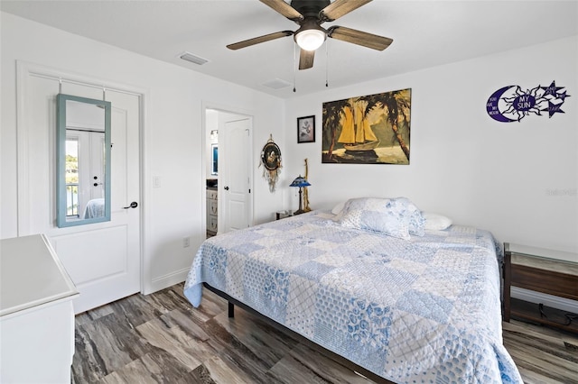 bedroom with hardwood / wood-style floors and ceiling fan