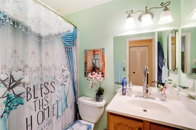 bathroom featuring vanity, toilet, walk in shower, and crown molding