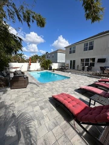 view of pool with a patio