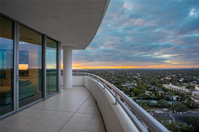 view of balcony at dusk