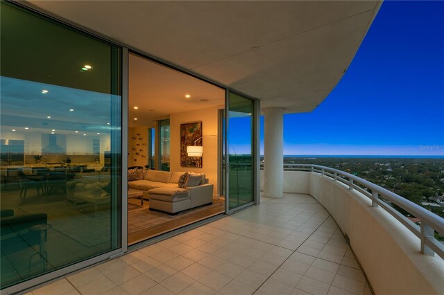 view of balcony at dusk