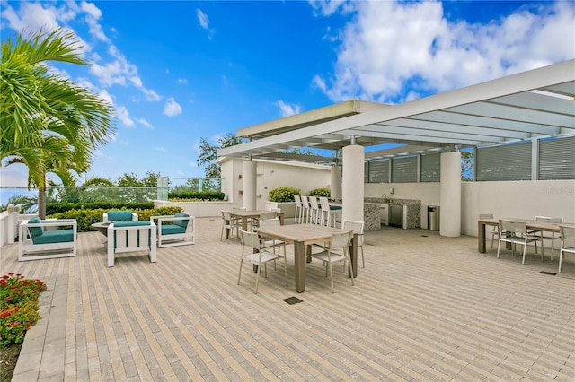 view of patio featuring outdoor lounge area, a pergola, and a wooden deck