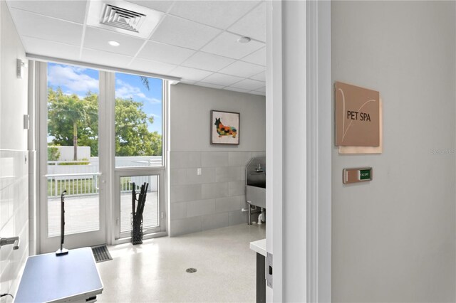 entryway with a paneled ceiling