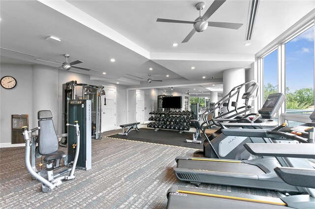 workout area featuring carpet flooring and ceiling fan