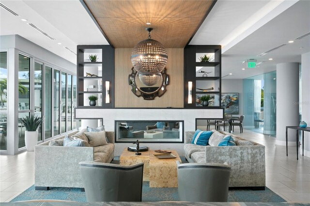 living room featuring tile patterned floors and a chandelier