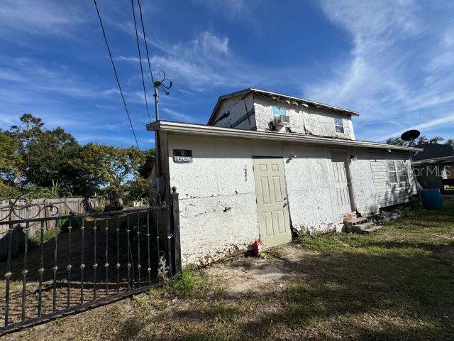 view of outbuilding with a yard