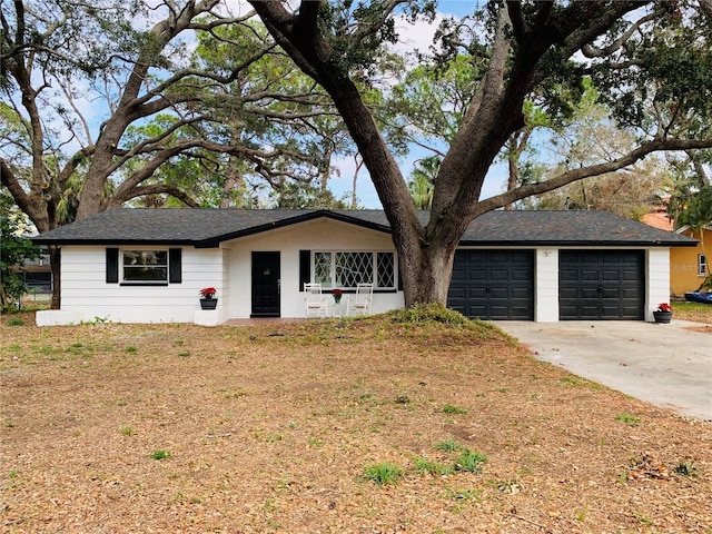 single story home with a garage