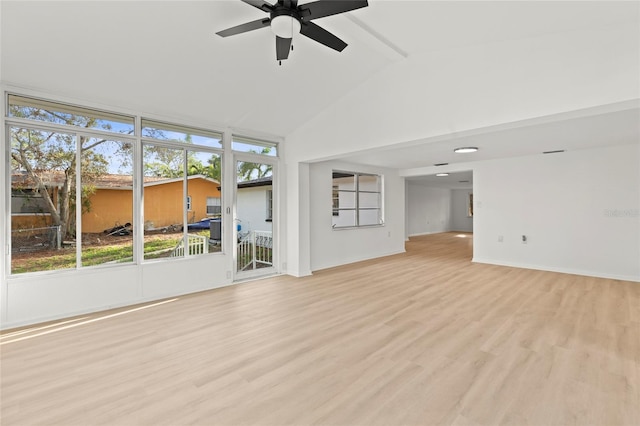 unfurnished living room featuring ceiling fan, light hardwood / wood-style flooring, and lofted ceiling with beams