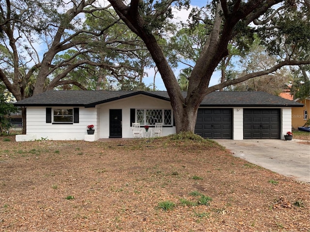 single story home featuring a garage