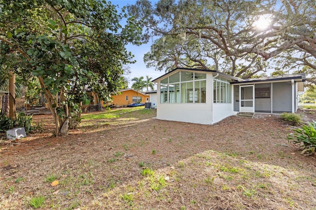 exterior space with a sunroom