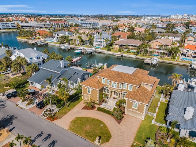 119 8th St E, Tierra Verde, FL 33715 - aerial perspective of suburban area with a nearby body of water