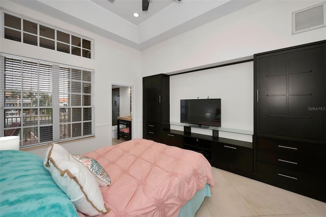 119 8th St E, Tierra Verde, FL 33715 - tiled bedroom with a high ceiling