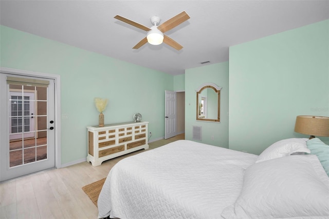 bedroom with ceiling fan, access to exterior, and light wood-type flooring