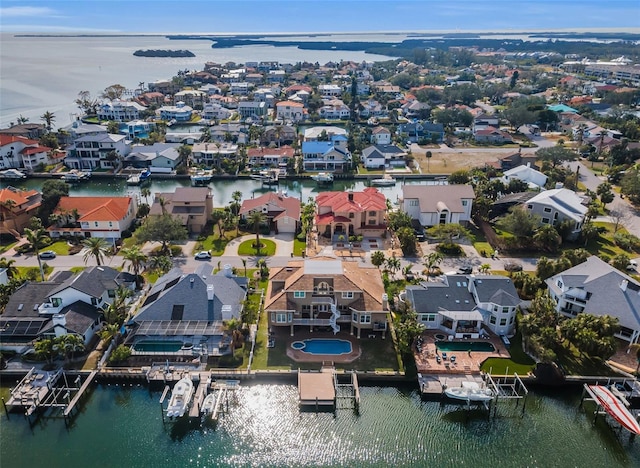 119 8th St E, Tierra Verde, FL 33715 - aerial perspective of suburban area with a large body of water