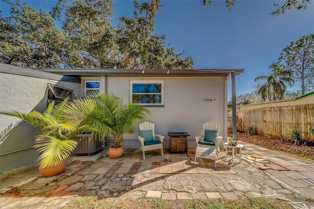 rear view of house with a patio