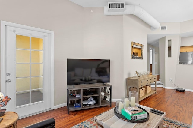 living room with wood-type flooring