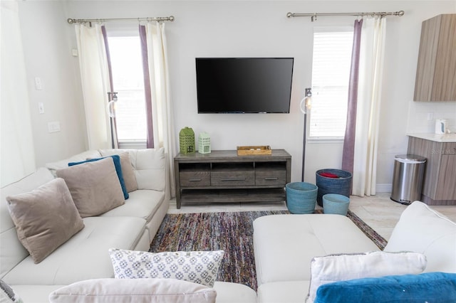 living room featuring plenty of natural light