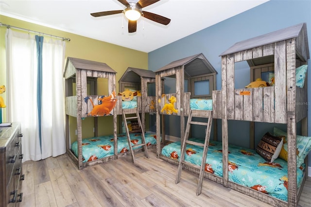 bedroom featuring ceiling fan and wood-type flooring