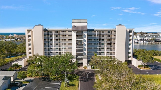 view of property with a water view