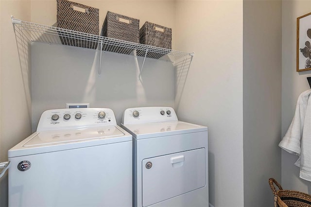 washroom featuring separate washer and dryer