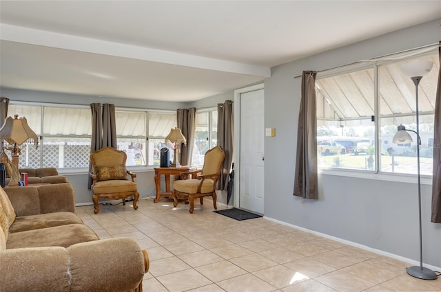 living area with light tile patterned floors