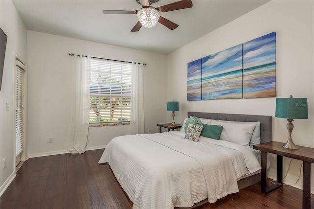 bedroom featuring dark hardwood / wood-style floors and ceiling fan