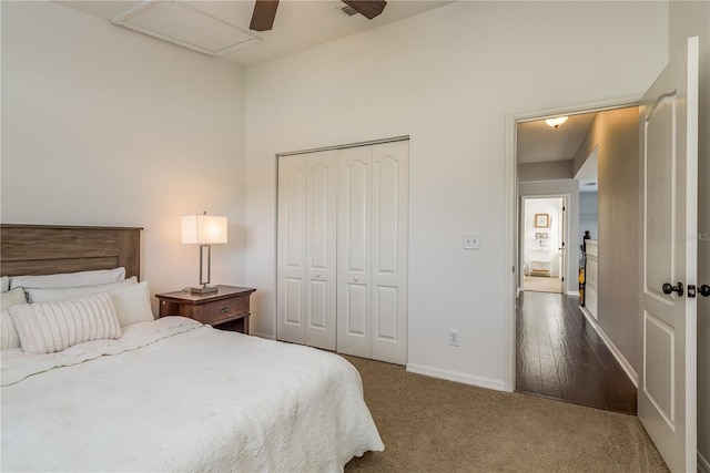 bedroom featuring a closet, hardwood / wood-style floors, and ceiling fan