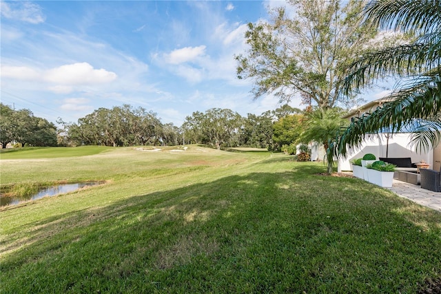 view of yard with a water view