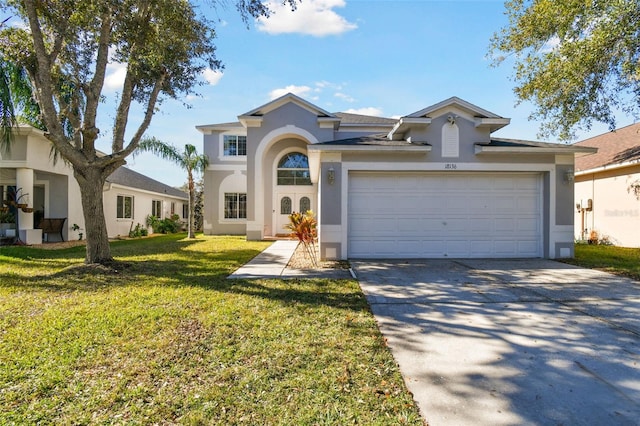 view of front of home featuring a garage and a front lawn