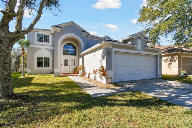 view of front of house with a garage and a front lawn