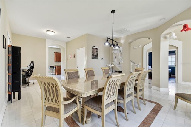 view of tiled dining space